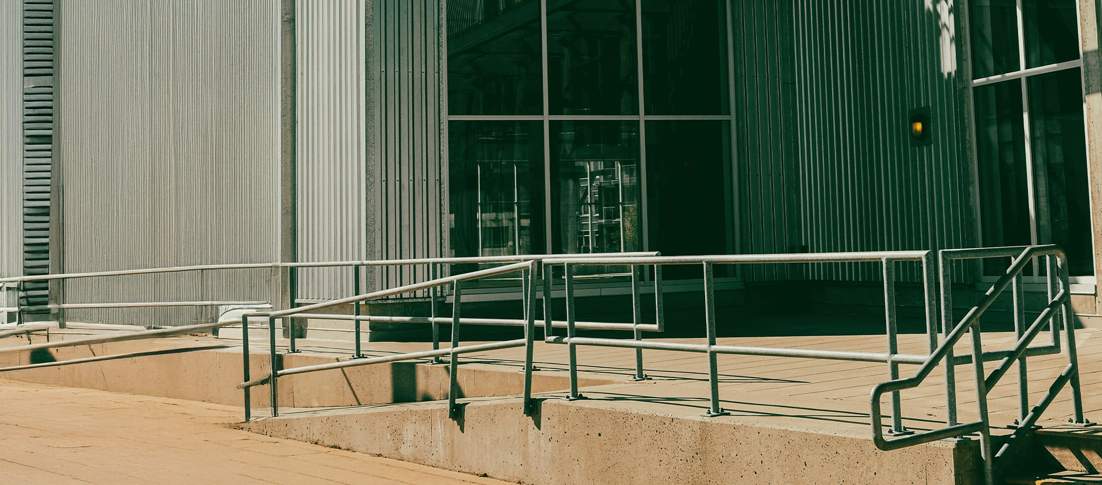 Why Digital Accessibility Matters: Wheelchair ramp image of entrance to building